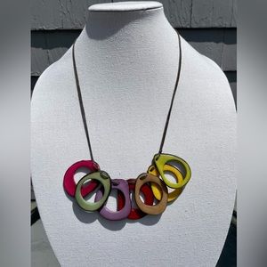 Vintage Colorful Plastic Necklace on 20” long corded string.